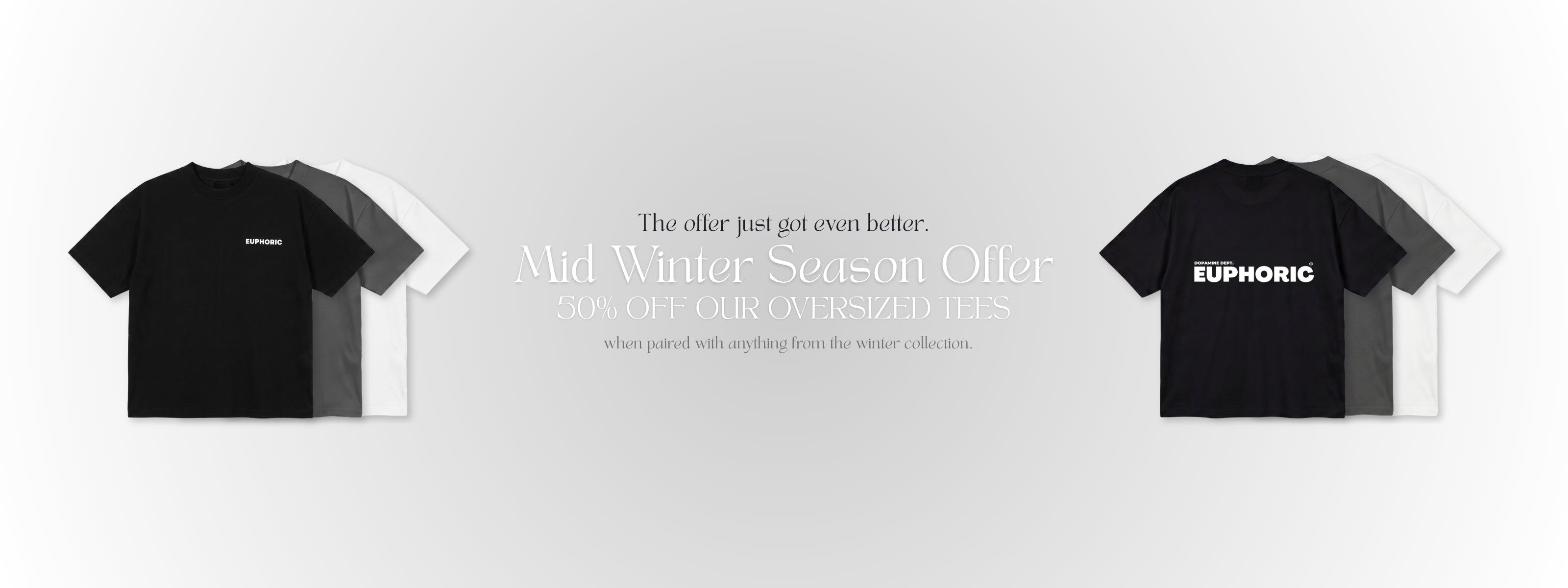 A promotional banner showing euphoric oversized t-shirts, displayed on a light gray gradient background with marketing text in the center. 